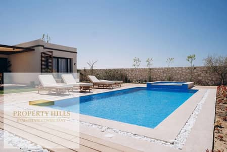 Villa for sale with double view overlooking the sea and landscape, finished with kitchen and air conditioning, at the lowest price in the market.