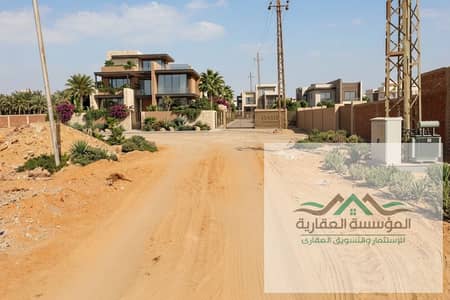 للبيع ارض مقننه خالصة مع الجهاز  بالثورة الخضرا بالشيخ زايد