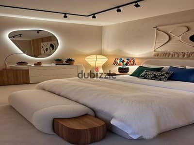 Studio apartment for sale in Sheikh Zayed, next to Al Ahly Club, with a down payment of 210,000 EGP and installments over 10 years. A fantastic offer
