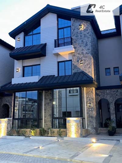 Townhouse ready to move prime location resale below market price in Marq Gardens New Cairo for sale