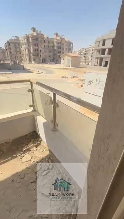 Ground floor apartment with garden for sale in Cairo University compound.