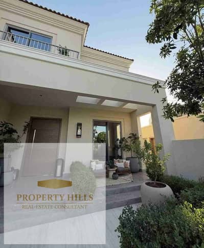 Villa for sale with a landscaped view in New Cairo, ready for viewing.