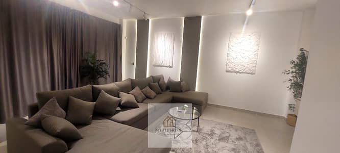 Furnished apartment for rent in Smart Life, fully air-conditioned, prime location near the American University, behind Concord Plaza