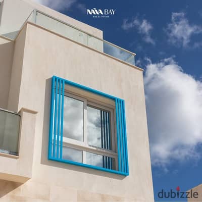 An **immediate delivery chalet with a private roof**, overlooking the **Crystal Lagoon**, fully finished, in **Ras El Hekma – Naia Bay**.
