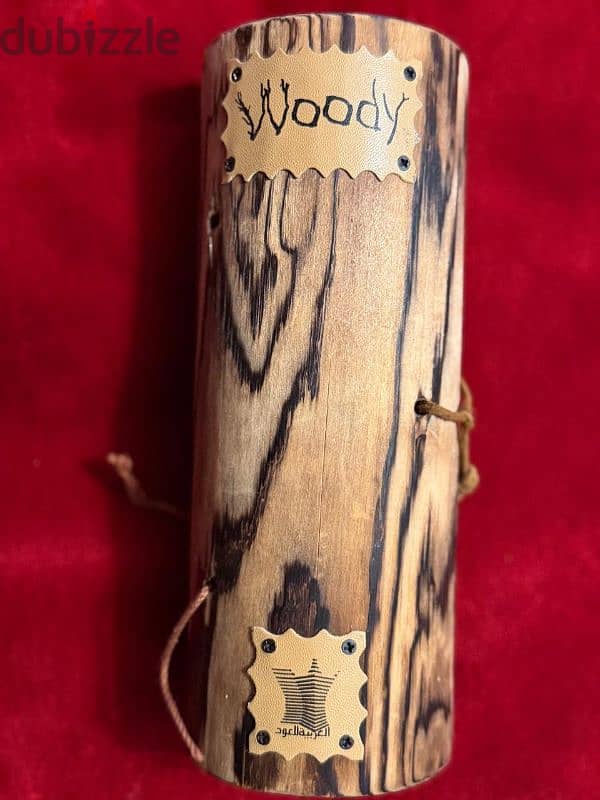 عطر woody 1
