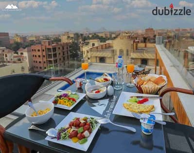 Hotel for sale in Al-Haram, a unique opportunity for tourism investment