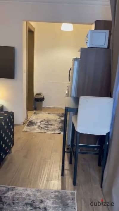 Furnished Studio for Rent in Eastown Sodic New Cairo Directly Next to AUC with 120 sqm Private Roof Panoramic View Short-Term Lease