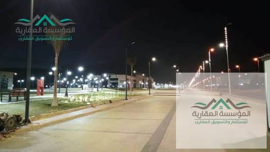 4 acres (16,800 meters) for sale in Basin 3, Al-Hizam Al-Akhdar - Sheikh Zayed - Steps to Dahshour - Cairo Alexandria Desert Road.