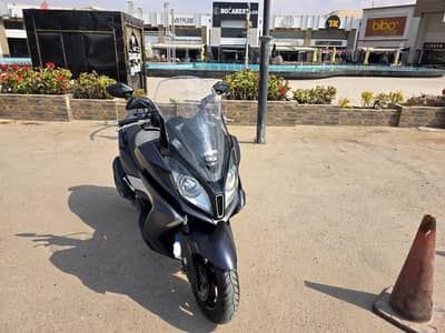 Kymco downtown 350cc كسر زيرو