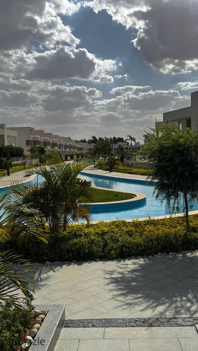 Twin house for sale in Lake West Compound, Sheikh Zayed. Delivery in one year.