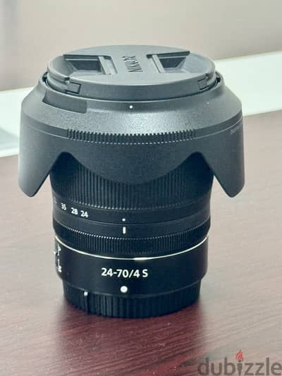 عدسة Nikon Z 24-70mm f/4 S بحالة الزيرو + كرتونة كاملة