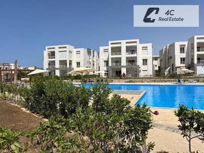 With down payment and installments a fully finished 2 bedroom chalet in prime location is for sale in Gaia Al Ahly Village North Coast