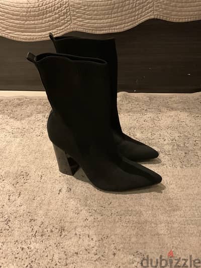 Black ankle high heel boot