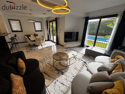 Townhouse for rent with a swimming pool in Mivida Compound