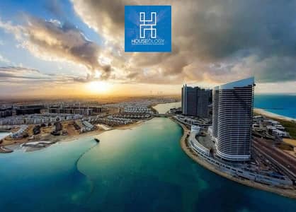 بفيو مميز علي البحر و ابراج العلمين اخر شقه بحري للبيع في الحي اللاتيني العلمين الجديده استلام فوري - متشطبه بالكامل The Lain District