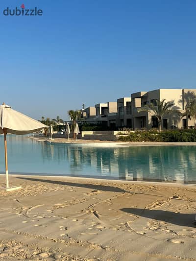Fully Finished Chalet with, Air Conditioning, and Kitchen – Near Delivery in Azha North Coast, with a Crystal Lagoon View