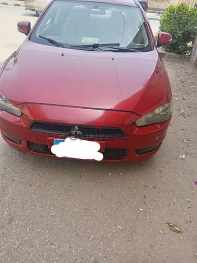 للايجار Mitsubishi Lancer EX شارك بالسائق داخل وخارج القاهرة