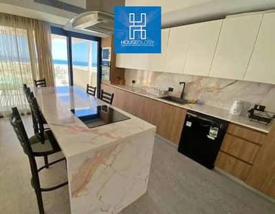Fully finished beachfront chalet with direct sea and lagoon views for sale in the final phase of Seashore Hyde Park, Ras El Hekma