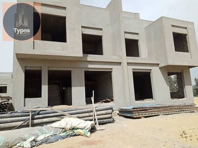 Twin house for sale, 262 square meters, in Lake West 3 compound, next to New Zayed and Karma Gates compound.