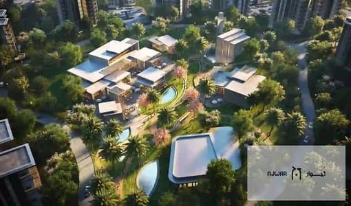 Quattro villa, 4 bedrooms, garden and roof, for sale in Madinat Noor, with 10-year installments, total price 9 million and 500