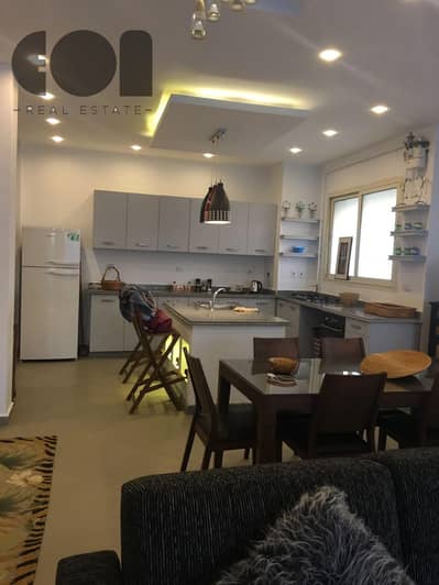 Luxurious apartment for rent, furnished, in the Park View compound owned by Hassan Allam, located in a prime location next to Al-Rehab