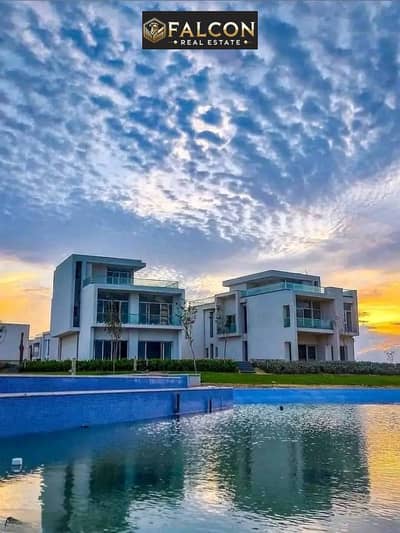 get now Villa for sale fully finished, located in front of the Alamein Towers! Featuring a direct sea view with VIP standards. A guaranteed investment