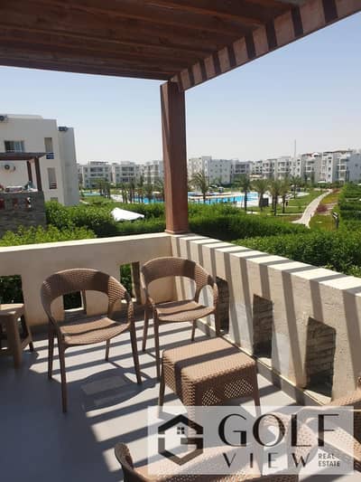 For sale: a fully finished 87-meter studio chalet with a rooftop terrace in the Amwaj Al-Ahli Sabour Village. The kitchen offers a direct view of the