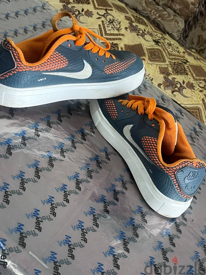 Nike Coach 1