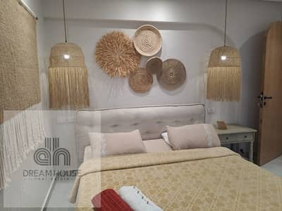 شقة أرضي بحديقة للبيع في ليك فيو ريزيدنس التجمع الخامس - مفروشة بالكامل lake view