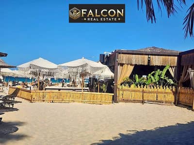 Chalet for sale in Telal Ain Sokhna village, with a distinctive view directly on the sea, with the lowest down payment