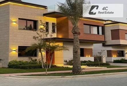 Lowest price townhouse with installments available in AZZAR 2 Compound, Fifth Settlement, with a distinctive layout, open view, ready to move
