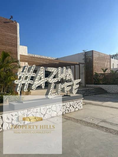 For sale 140 sqm sea view chalet in Azha Sokhna, ready to move in Located on the Suez Road this 3bedroom chalet is fully finished  prime azha Sokhna
