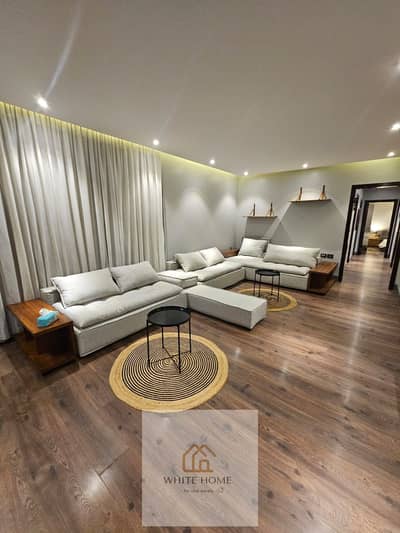 Furnished apartment for rent in Eastown Compound, ultra-modern, prime location, at the lowest price in the market.
