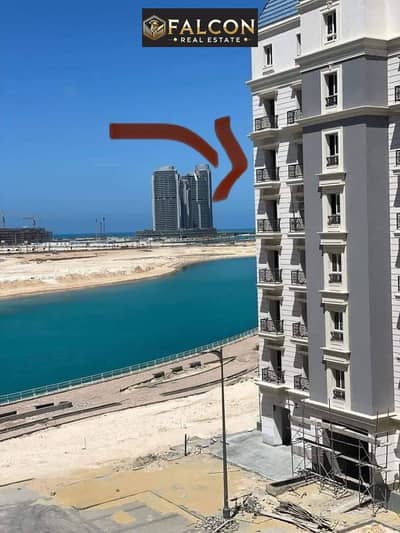استلم ب 700ألف شقه فى الحي اللاتيني دبل فيو على ابراج العلمين وصف اول علي بحيره العلمين متشطبه بالكامل جاهزه للمعاينه