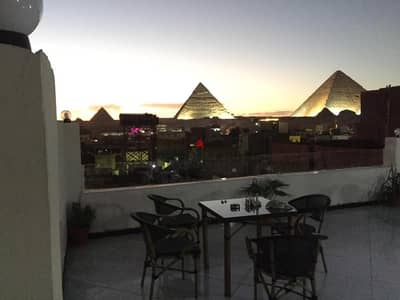 فرصة روف لقطة+Out Area بView اهرامات للبيع بسعر مش هيتكرر ايجاره يومي بالدولار بأرقى كمبوند بجوار المتحف المصري في أكتوبر