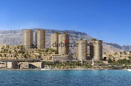 شالية للبيع متشطب بالتكيفات بفيو علي البحر في اول ابراج علي البحر الاحمر في مدينة الجلالة
