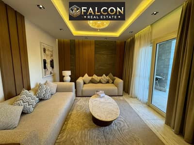 Apartment with a double garden view for sale at a special price in Sarai Compound, next to Madinaty on the Suez Road, with a 50% discount.