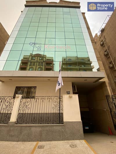 Building for rent, 2000 sq m, licensed and equipped to the highest standards, super deluxe finishing, near Carrefour on the Maadi Ring Road in Zahraa