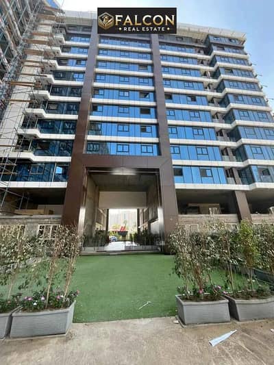 بعائد ايجاري يومي 250$ امتلك شقه فندقيه متشطبه بالكامل دايركت علي مطار الماظه في مصر الجديده