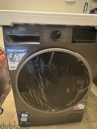 غسالة بيكو 10 كيلو بالمجفف رمادي انفرتر بالبخار والكي beko 10KG dryer