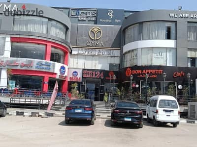 محل تجاري للإيجار في شارع التسعين – مجمع البنوك - القطاع الأول (مول 124) - التجمع الخامس - القاهرة الجديدة