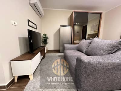 Apartment with roof ultra modern finishing, Fully furnished first use for rent at Sodic Eastown Compound New Cairo near to garden,pool ,gym, Clubhouse