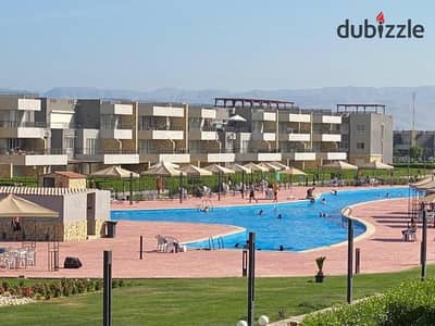 Under Market Price Chalet 130 m 3 bedrooms fully furnished & ACs and with prime location overlooking swimming pool for sale in Blumar El Sokhna
