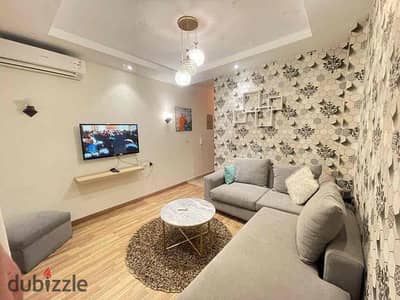 Furnished apartment for daily or monthly rent for families in Sheikh Zayed, a prime location next to all malls.
