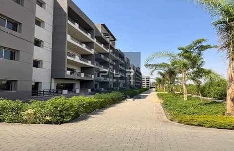 Fully finished apartment for sale in Stoda Compound, directly on Suez Road, with 10% down payment, installments up to 10 years, and immediate delivery
