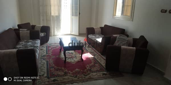 For sale in Badr City, 180 sq m apartment, first floor, first district, fifth neighborhood, directly on the main road, very prime location