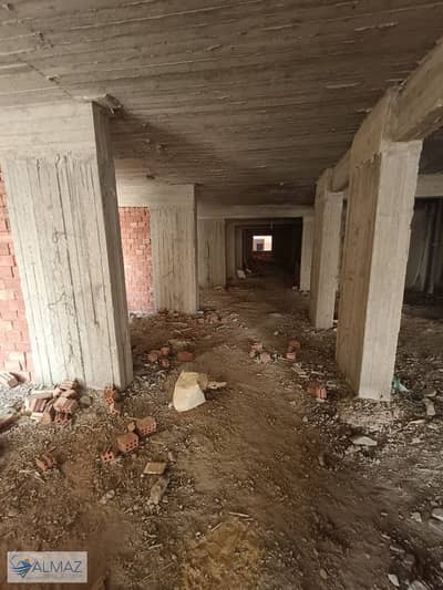 Entire floor for sale in Ain Shams, suitable for administrative or commercial use, factory, or gym. Direct from the owner, on a main 80-meter street.