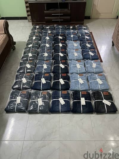 جينز جديد فيه جمله  Pull and Bear