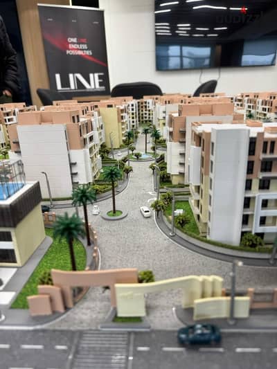 Apartment for sale, 125 sq m, two bedrooms, in Elysium Compound, Sheikh Zayed, Green Revolution area, with a 10% down payment and installments up to 1
