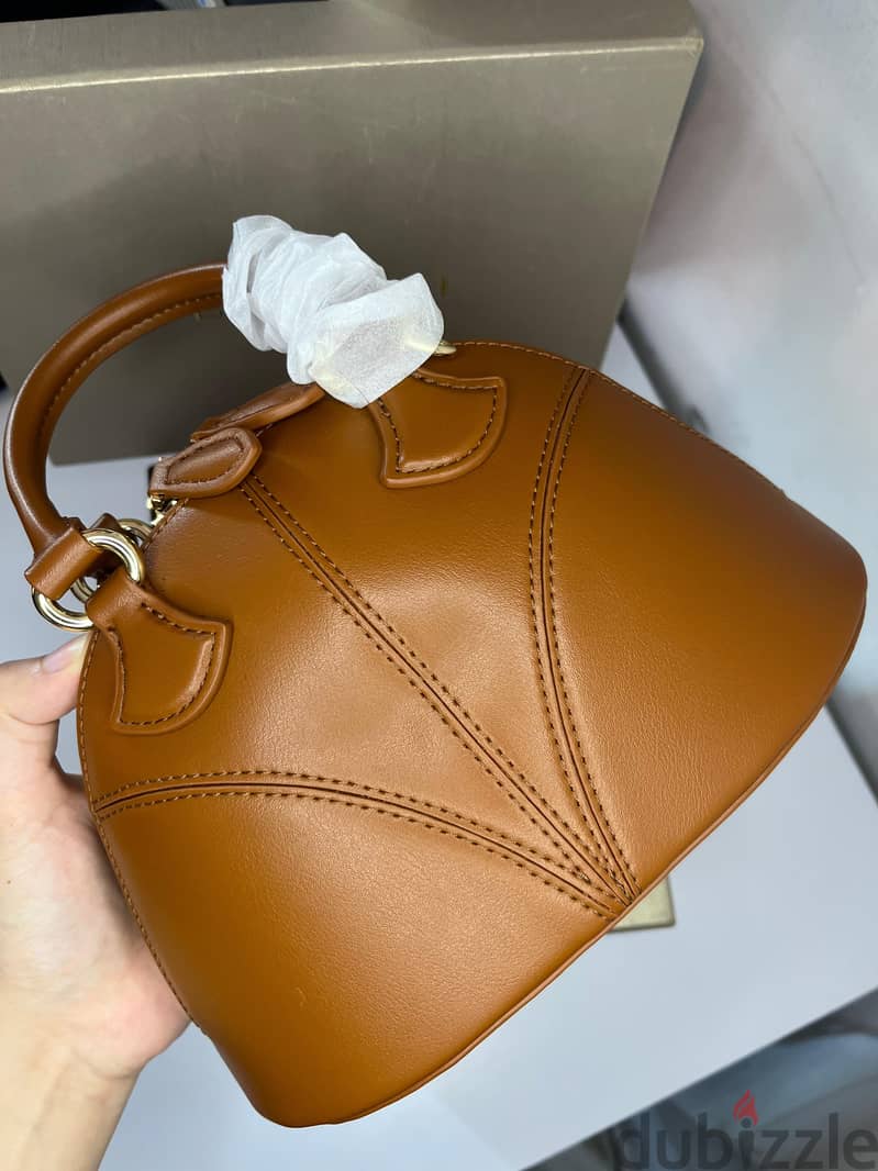 Title:Authentic Bvlgari Mini Leather Top Handle 4